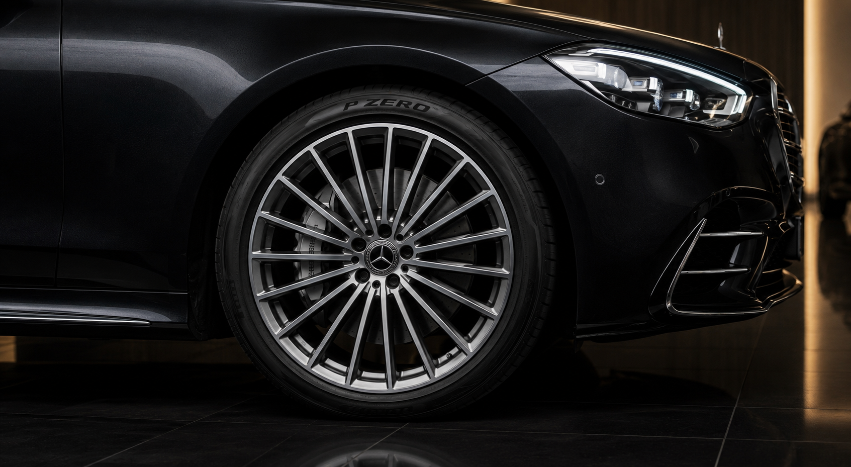 Detail of the Mercedes-Benz S-Class forged wheel and headlight