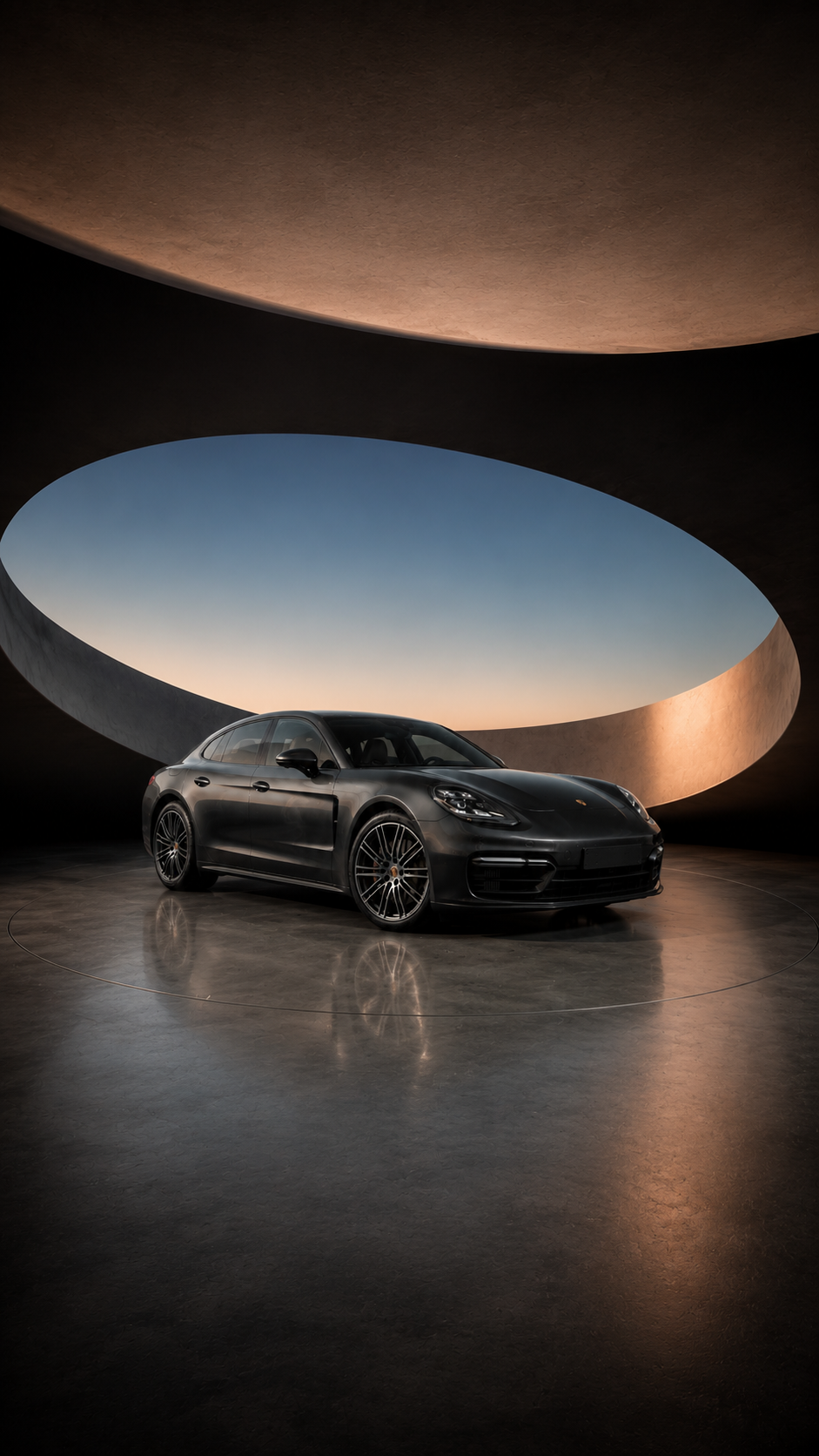 Porsche Panamera 4S front three-quarter view in a sculptural concrete rotunda